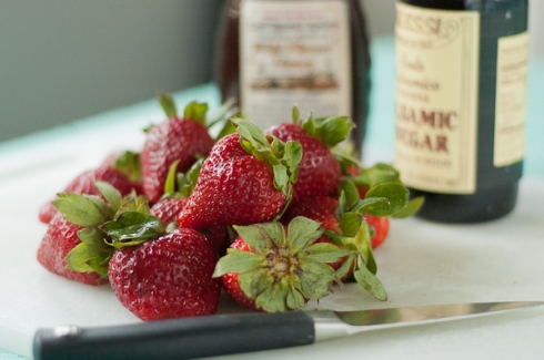 strawberries, honey, balsamic vinegar, and a sharp knife